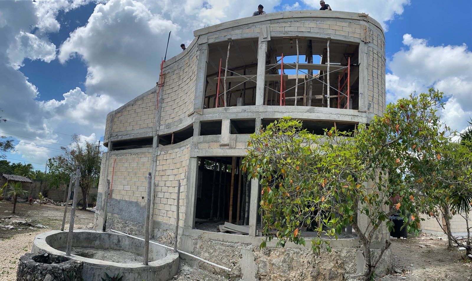 Casa Blanca rough concrete block exterior with citrus trees, Rancho Verde Tulum, Tulum, Mexico