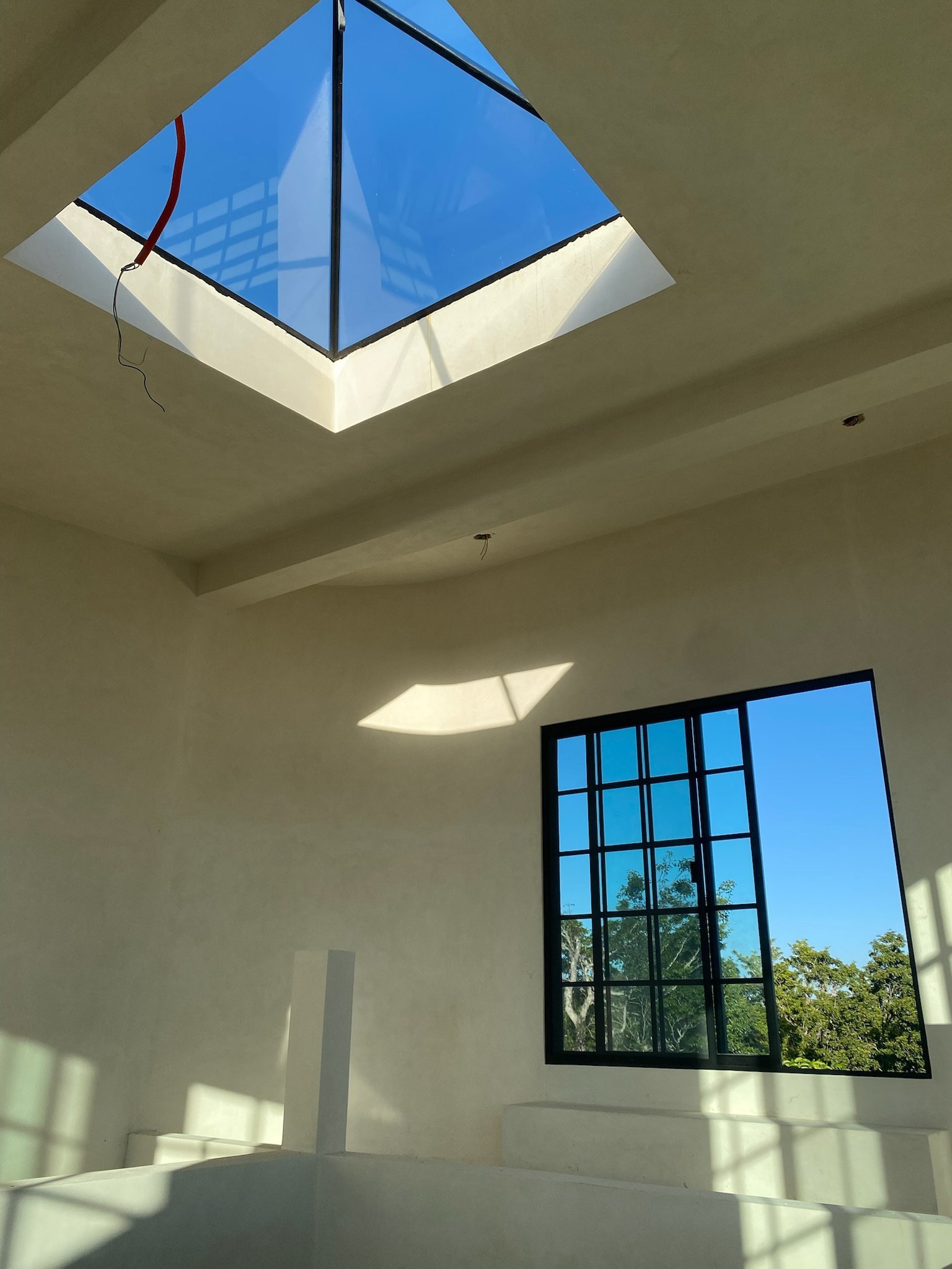 Looking up through the pyramid roof window from inside, Rancho Verde Tulum, Tulum, Mexico