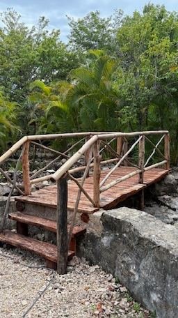 Wooden garden bridge pathway, Rancho Verde Tulum, Tulum, Mexico