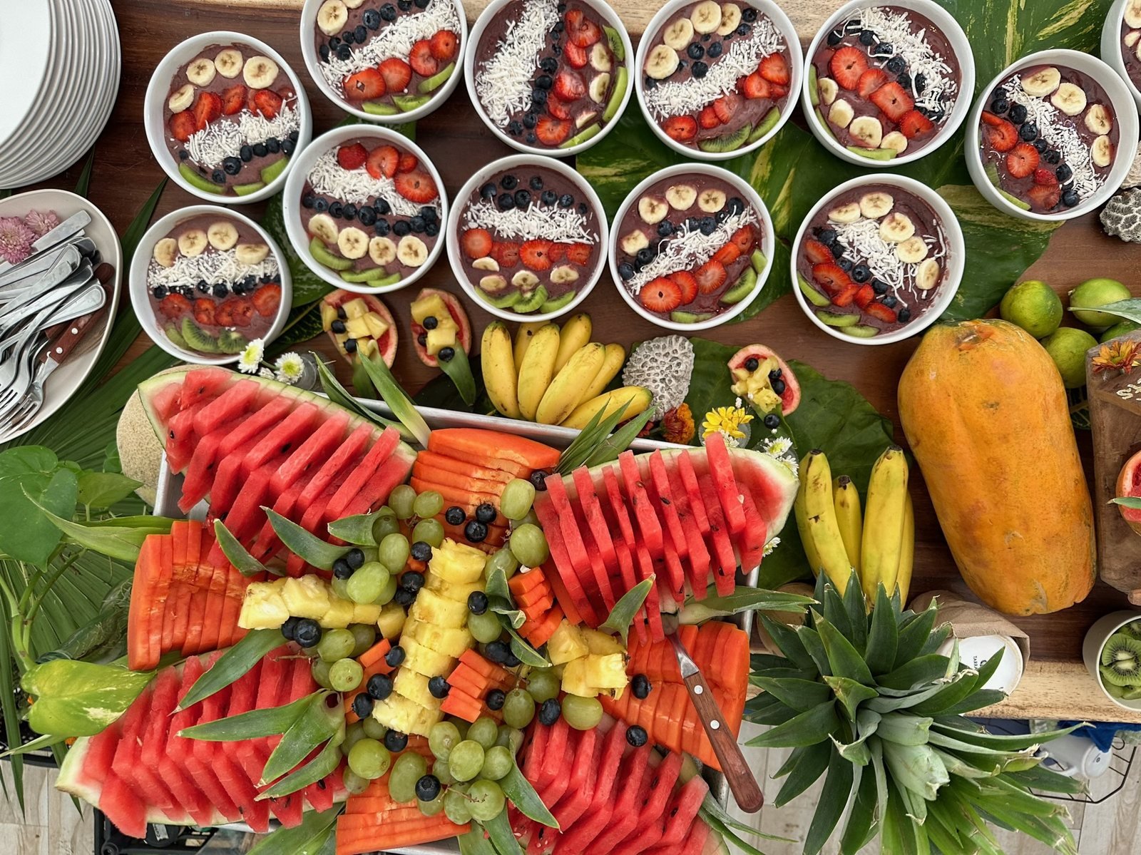 Acai bowls and a tropical fruit buffet with watermelon, papaya and pineapple, vegan event catering by Liefs Tulum at Rancho Verde