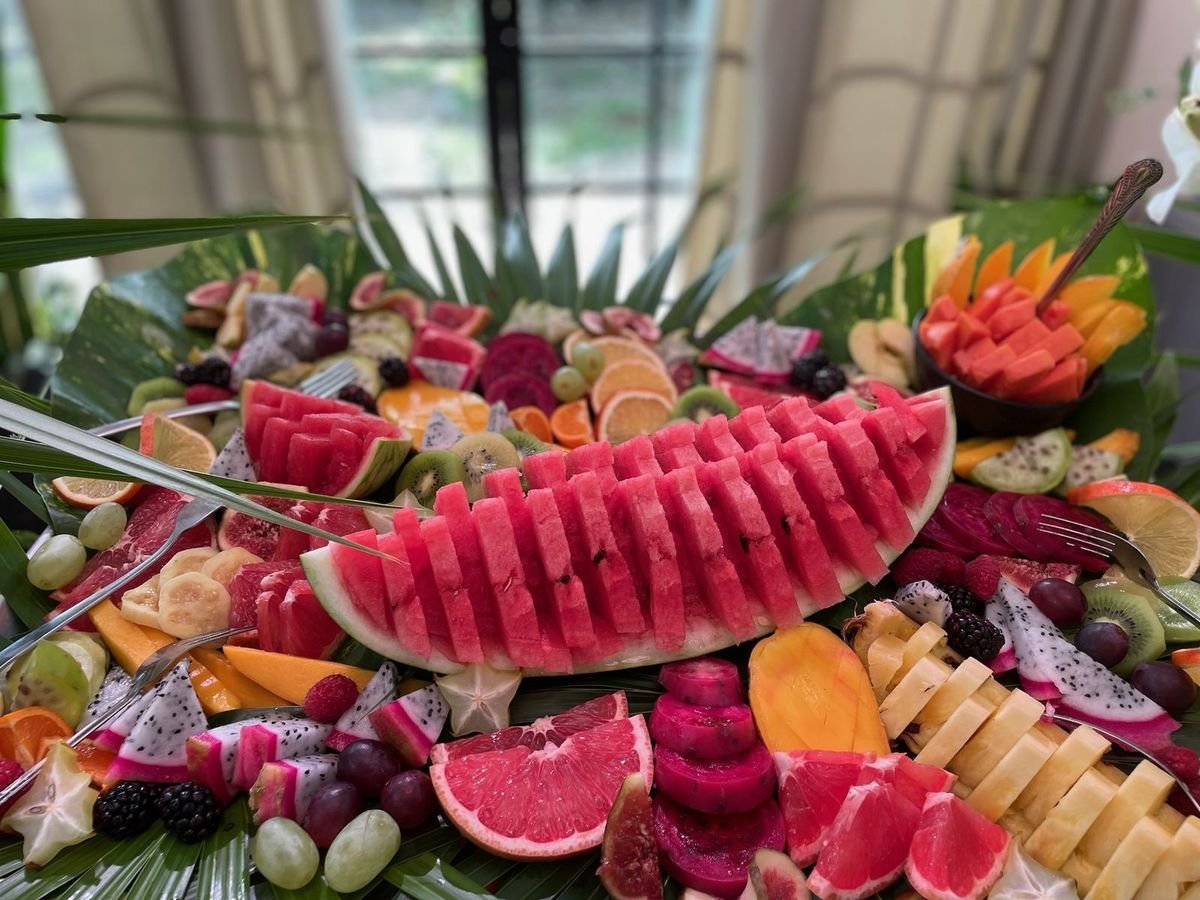 Tropical fruit platter with watermelon, dragon fruit, pineapple and grapefruit, vegan event catering by Liefs Tulum
