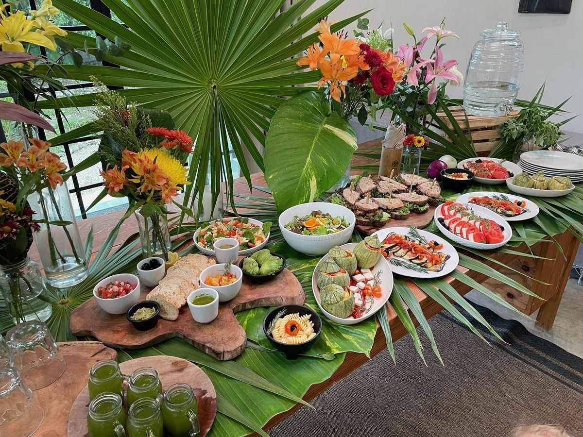 Plant-based lunch buffet with stuffed zucchini, vegan caprese, pasta salad and sandwiches by Liefs Tulum