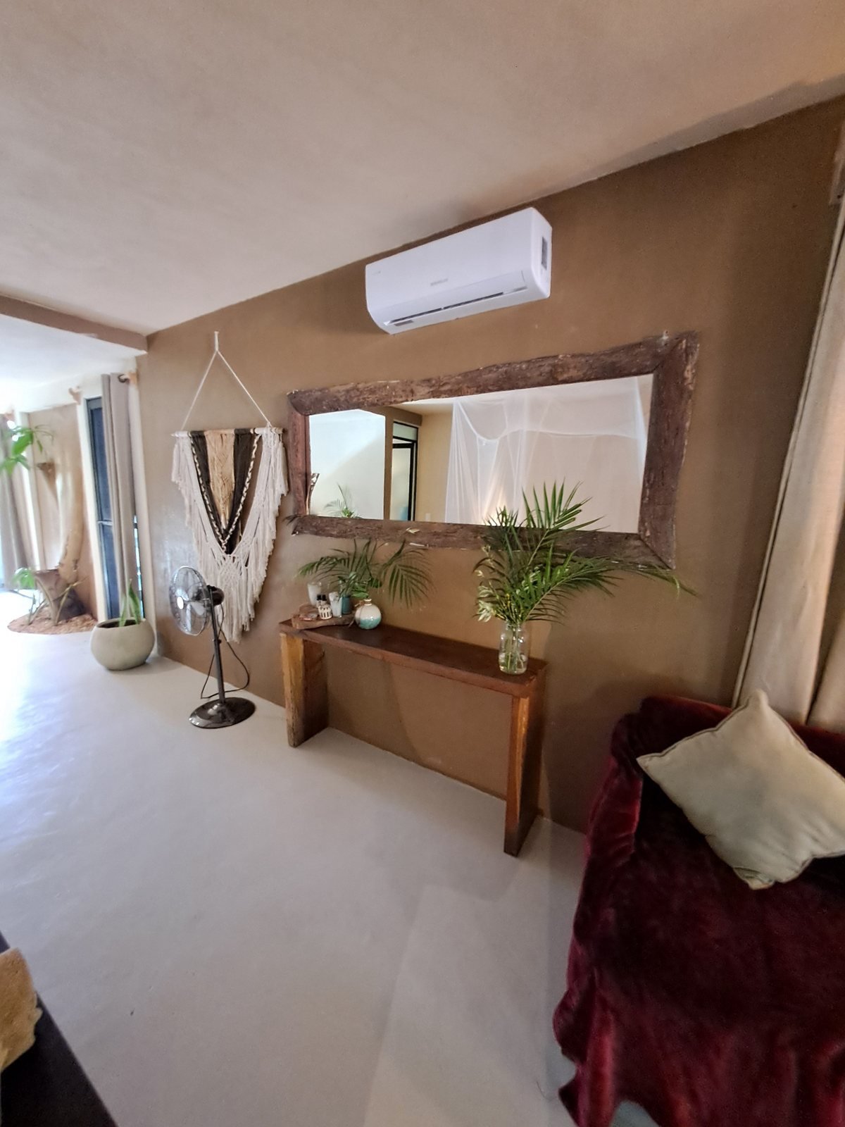 Rustic mirror, console table and macrame wall hanging, The Chapel, Airbnb at Rancho Verde Tulum