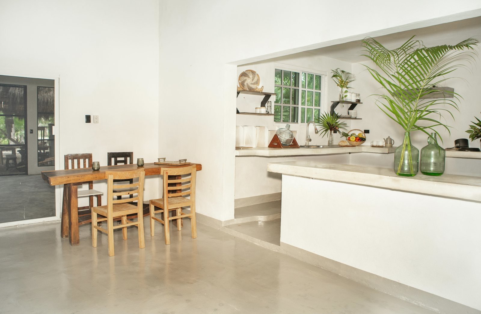 Dining table and open kitchen, The Family House, Airbnb at Rancho Verde Tulum