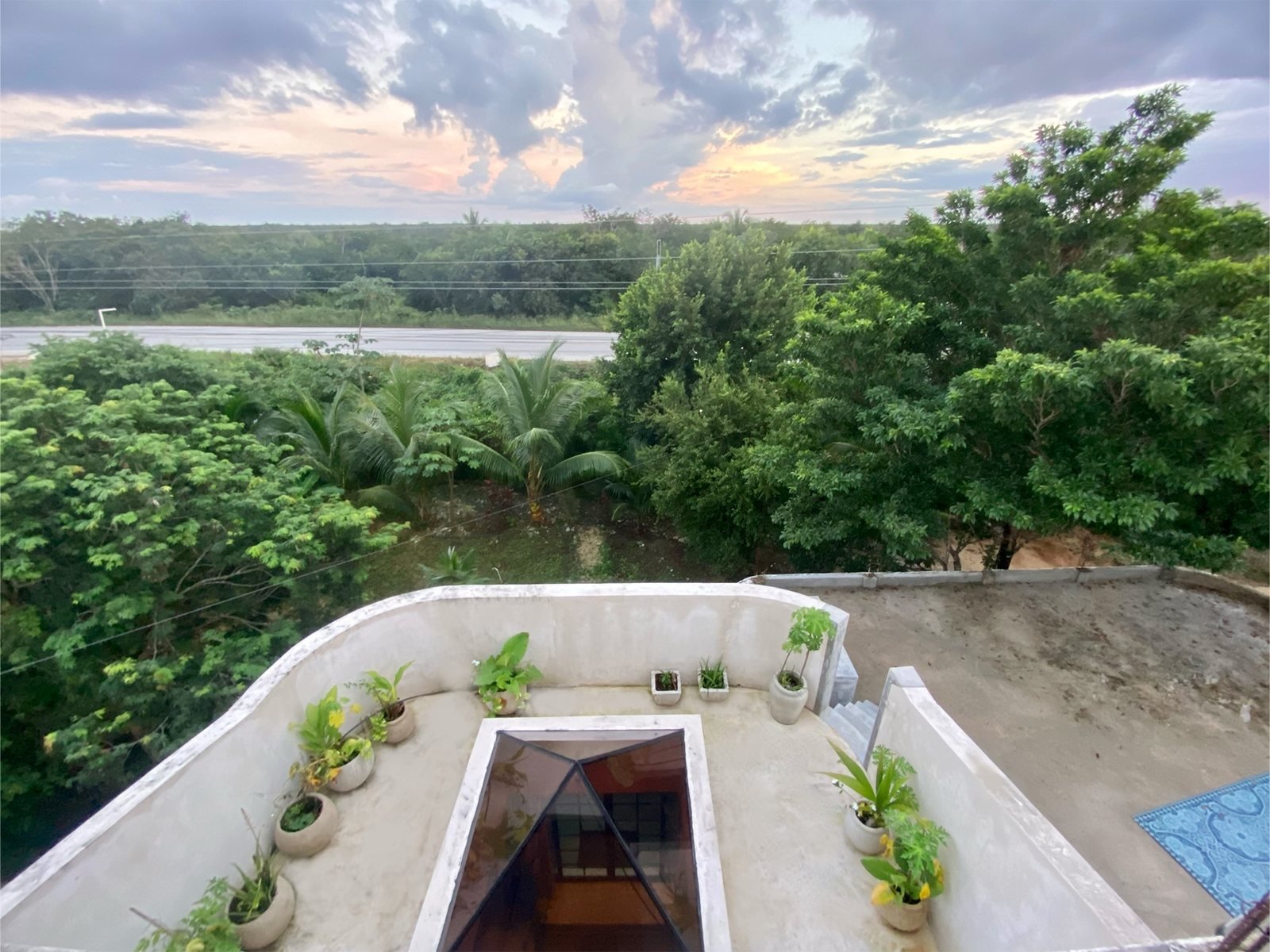 Rooftop terrace with pyramid skylight overlooking the jungle, Airbnb at Rancho Verde Tulum