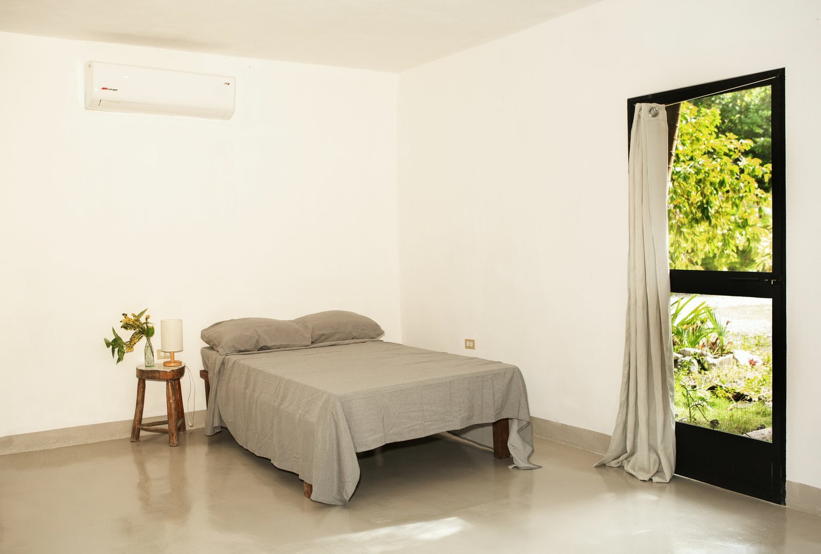 Studio with queen bed, air conditioning and a screened garden door, The Studio w. Bathroom, Airbnb at Rancho Verde Tulum