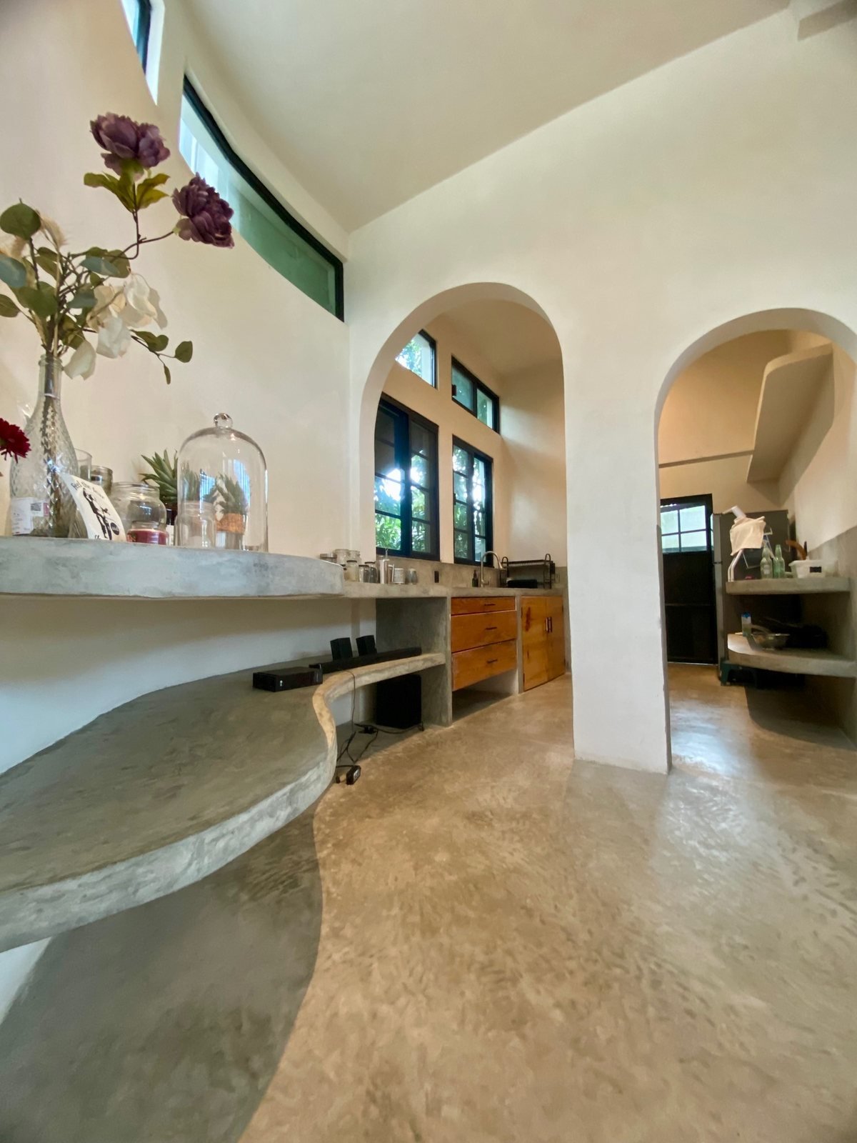 Arched kitchen with polished concrete counters, The Villa, Airbnb at Rancho Verde Tulum